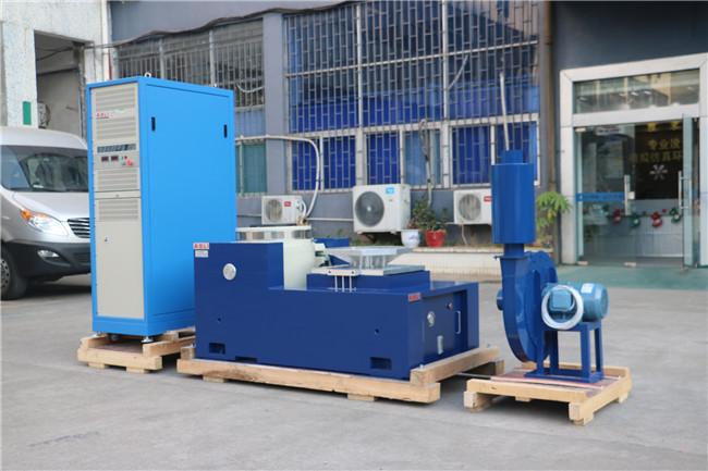 ES-10 Electrodynamic Vibration Shaker — front view showing the main testing platform and air cooling system